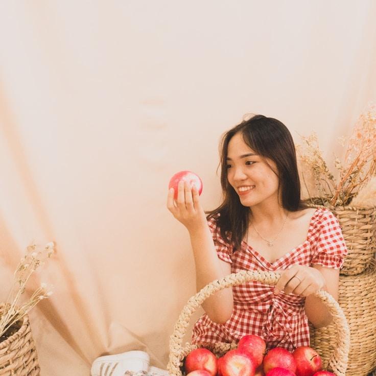 Kaveri Mehta, Lead Design Curator at Calm Journey Stories, reviewing corporate floral arrangements